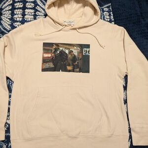 Rowing Blazers Willy Spiller Cream Hoodie with Graphic Design